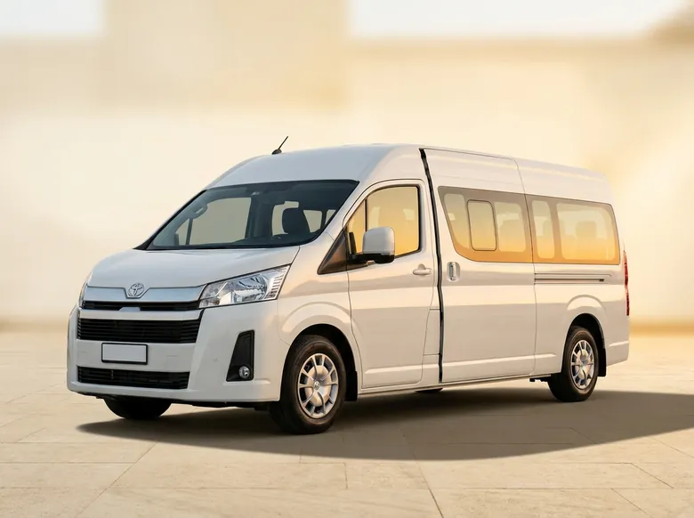 White Toyota Hiace 14-passenger minibus